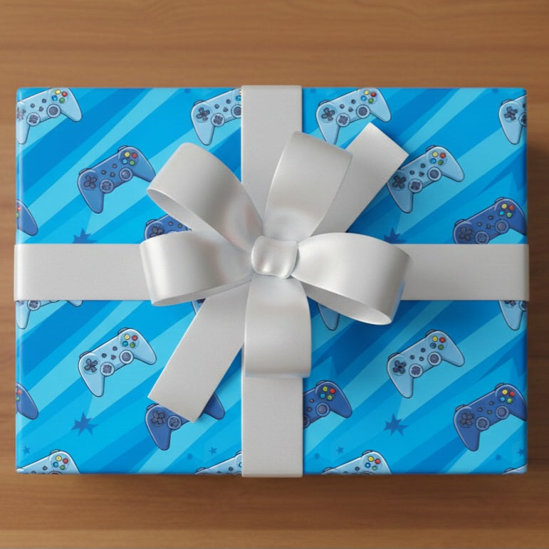 Gift box with blue gaming controller pattern and white bow on a wooden surface